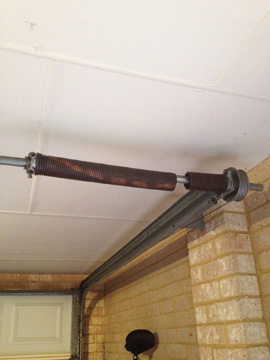 Broken Garage Roller Door Internal Spring Drives