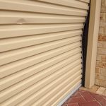 Broken Cream Colour Garage Roller Door