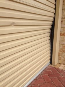 Broken Cream Colour Garage Roller Door