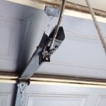 Broken Garage Roller Door Hinge Opener