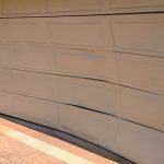 Broken Cream Colour Garage Roller Door