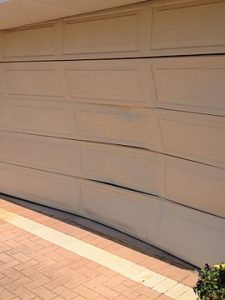 Broken Cream Colour Garage Roller Door